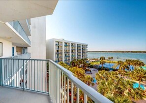 The view from the balcony showcases the beauty of the surrounding landscape, inviting you to immerse yourself in the tranquility and serenity of the outdoors.