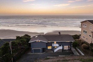 Perched on a cliff overlooking the home boasts breathtaking panoramic views that will keep you coming back year after year.