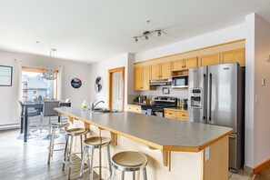 Huge kitchen with island and seating for 4