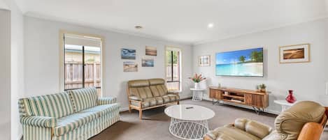 Comfortable living area with smart tv