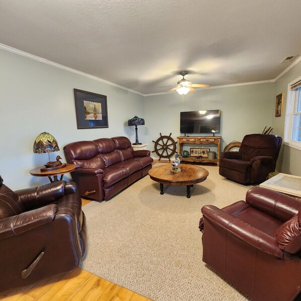 Living area has 4 Recliners.  