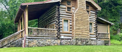 The cabin is a work of art, made of of timbers and riverstone