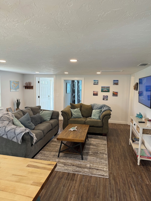 Queen sleeper Sofa, and smart tv.