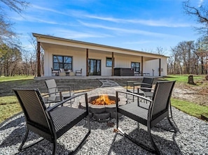 Wood Burning Firepit and Back Porch View