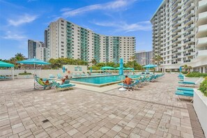 View of pool and property