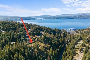 Perched on a wooded hill, surrounded by pine trees, while close to everything!