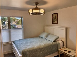 Bedroom 2 has a queen and new set of bunk beds.