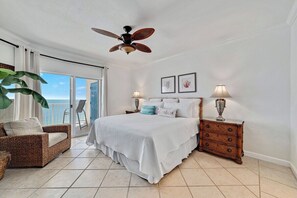 Primary bedroom with balcony access and a view!