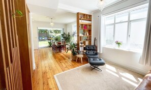 Take a seat and enjoy reading in the genuine Eames lounge chair and ottoman