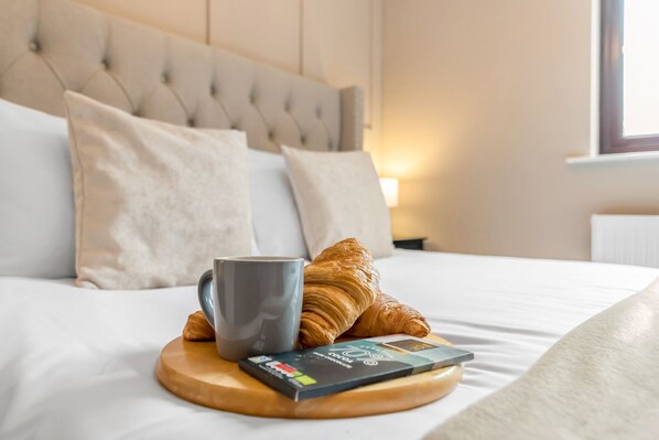 Indulge in regal comfort: Bedroom 3 beckons with a lavish king-size bed, ensuring nights of unparalleled relaxation in our welcoming property. 