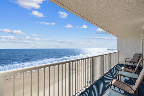 You'll won't miss any of the action from this wide balcony.