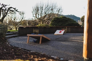 Enjoy some outdoor games at the house including Cornhole.