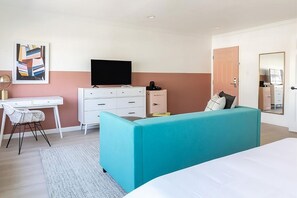 Comfortable Suite with a King bed and sofa. The exact room will be assigned upon arrival.
