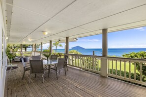 Relax and enjoy the Pacific ocean views from the covered lanai.