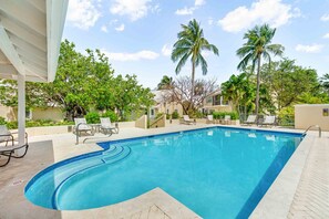 The communal freshwater pool is steps away from Villa #6.