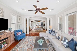 Living room overlooking dining room and kitchen