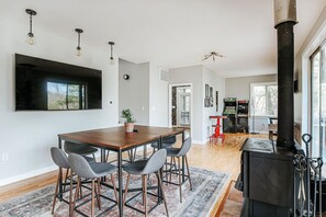 [Main Floor] Is it a game table or a table to enjoy the game on that 75" TV? You decide. 