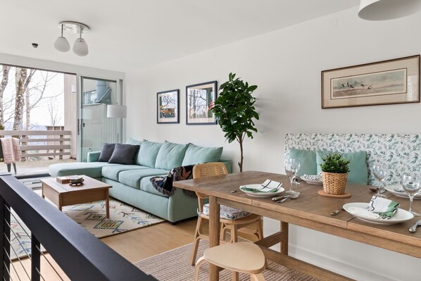 Cozy open Living Room with Gas Fireplace and kitchen
