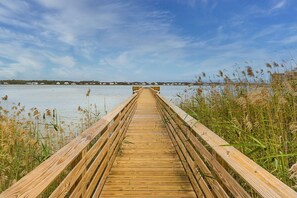 Fishing pier directly behind the community stretches 100' out over Little Lagoon