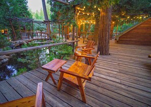 Private Back Deck that overlooks our ponds and streams