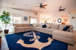 Spacious Living Room with plenty of seating for all.