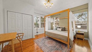 King Bedroom with canopy bed, hanging sheets and dedicated workspace!