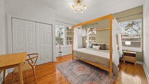 King Bedroom with canopy bed, hanging sheets and dedicated workspace!