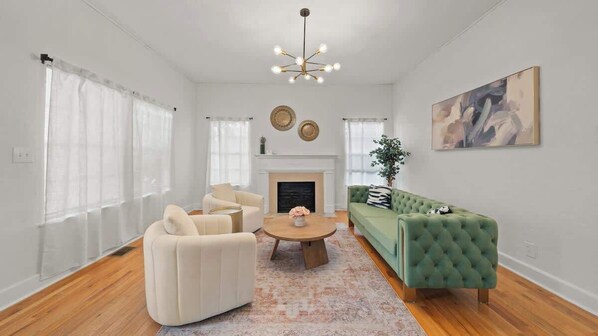 Relax in our formal living room with two comfy swivel chairs!