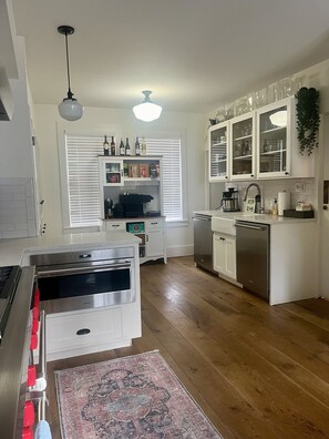 Gorgeous gourmet kitchen.Wolf appliances SubZero fridge