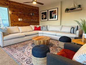 HUGE living room with sectional sofa for 6-8 people, and four armchairs