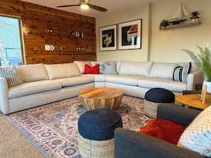 HUGE living room with sectional sofa for 6-8 people, and four armchairs