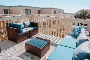 Private outdoor patio deck with complimentary beach chairs available