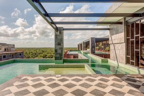In the luxury community of Amira District with communal pools & jungle gardens