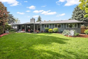 The spacious yard is a great place for sunbathing, games, and picnics.