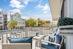 Large deck that has access via 4 different sliding doors