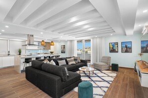Step into comfort and style in our spacious living room with modern décor!
