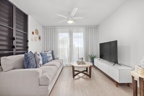 Indulge in some well-deserved relaxation in our cozy living space.