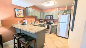 bar area and kitchen