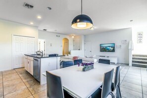 Spacious dining area, perfect for family meals and game nights.