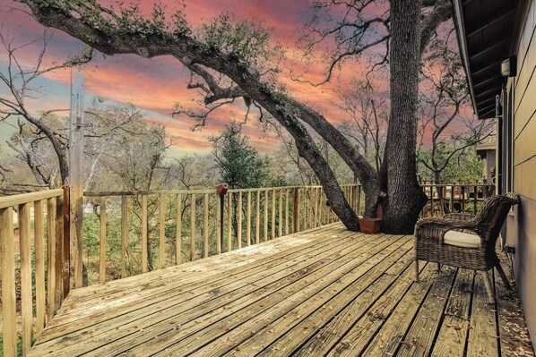 patio facing a creek and park