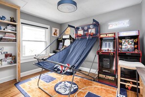 Our game room features hundreds of arcade games, darts & pop-a-shot