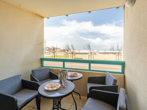 Table, Furniture, Property, Sky, Building, Couch, Azure, Cloud, Shade, Interior Design