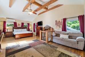 You'll feel pampered like royalty on the comfortable king-size bed in the primary bedroom.