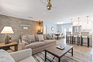 Living Room, open to the kitchen and dining area, perfect space to unwind.