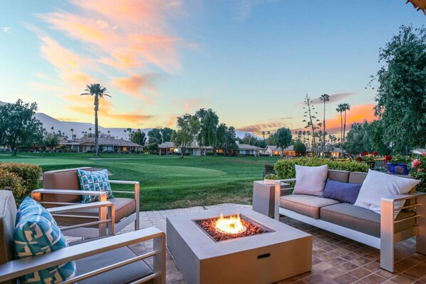 Gorgeous sunset view over the Monterey Country Club, fire pit, and outdoor patio