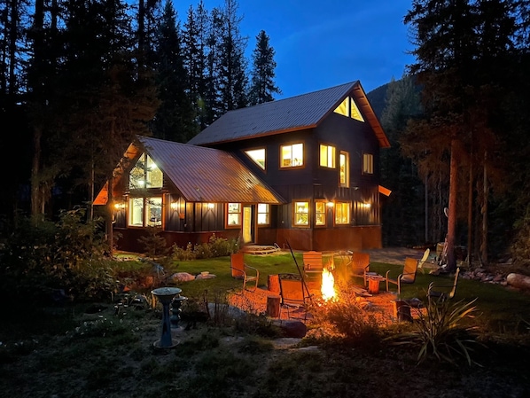 Evening outdoor view of our yard and fire pit.