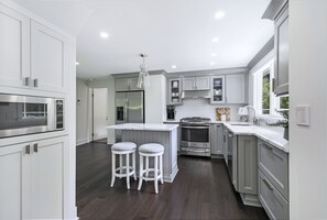 Kitchen with view of door to the main bedroom and bathroom