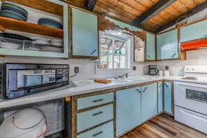 Fully stocked kitchen ready for home-cooked meals or mountain morning breakfasts