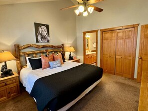 Bedroom 1 has a king size bed, smart TV and attached ensuite bathroom