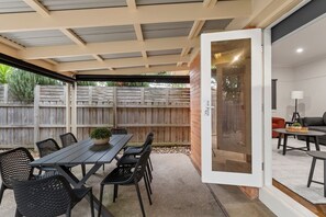 Dine alfresco and soak up that crisp country air out on the covered patio.
